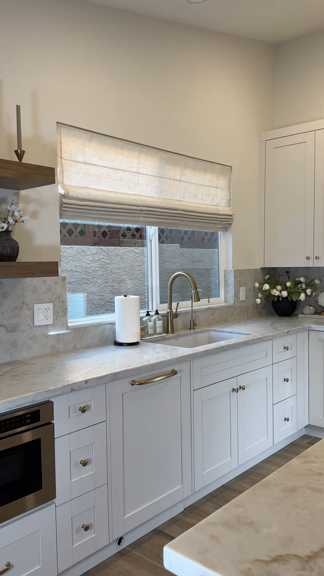 Our kitchen window got an upgrade! This roman shade ties the whole kitchen together. I love the added privacy without losing the natural light! 

Use code HALEYK10 for an additional 10% off current promotions  

Shade details: 
• Color: Harper Cloud
• Mount: inside
• Lift: motorization
• Fold: pleated fold
• Liner: standard

#LTKHome #LTKSeasonal #LTKSaleAlert