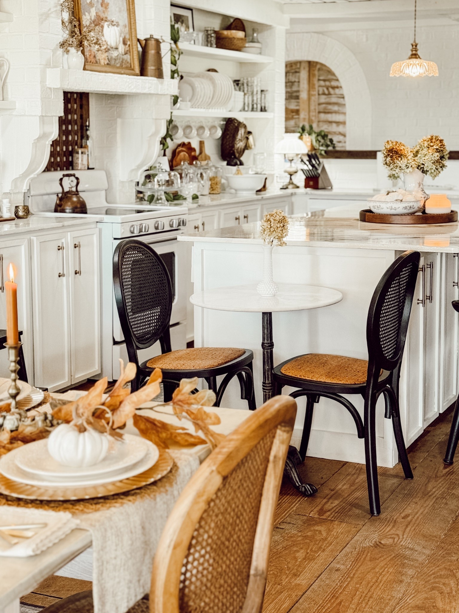 Loving the extra seating with this little bistro table at the end of my island 🤍🖤🤍 

#LTKHome #LTKSeasonal