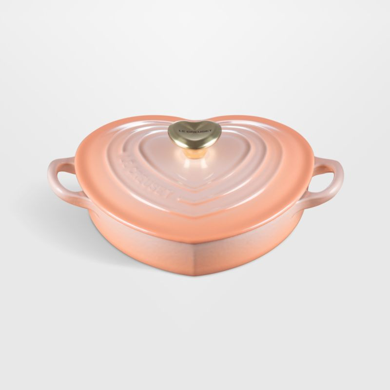 Le Creuset Peche 1.25-Qt. Heart Dish | Crate & Barrel | Crate & Barrel