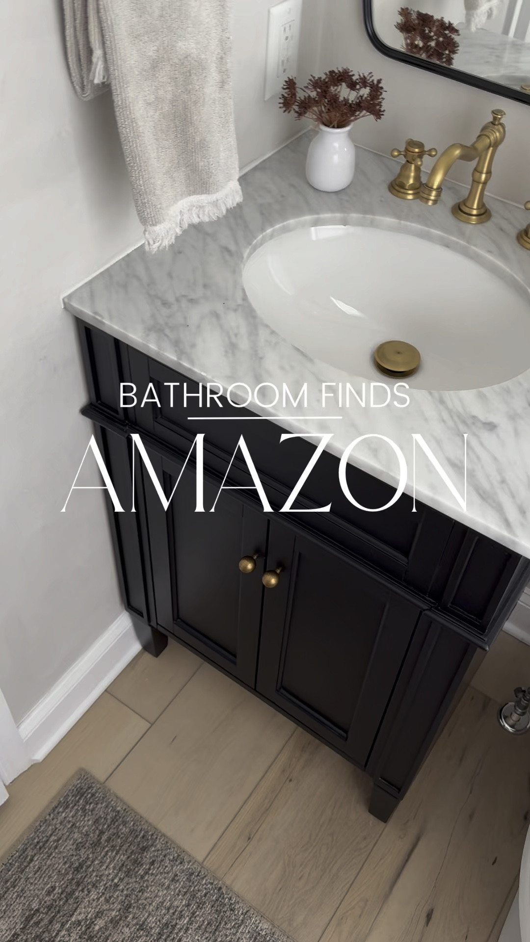 All of the antique brass hardware works so well together! 

Amazon bathroom finds, Amazon affordable finds, modern organic bathroom, brass hardware, motion sensor trash can, Amazon trash can, budget bathroom, affordable powder room, 

#LTKHome #LTKFindsUnder100 #LTKVideo