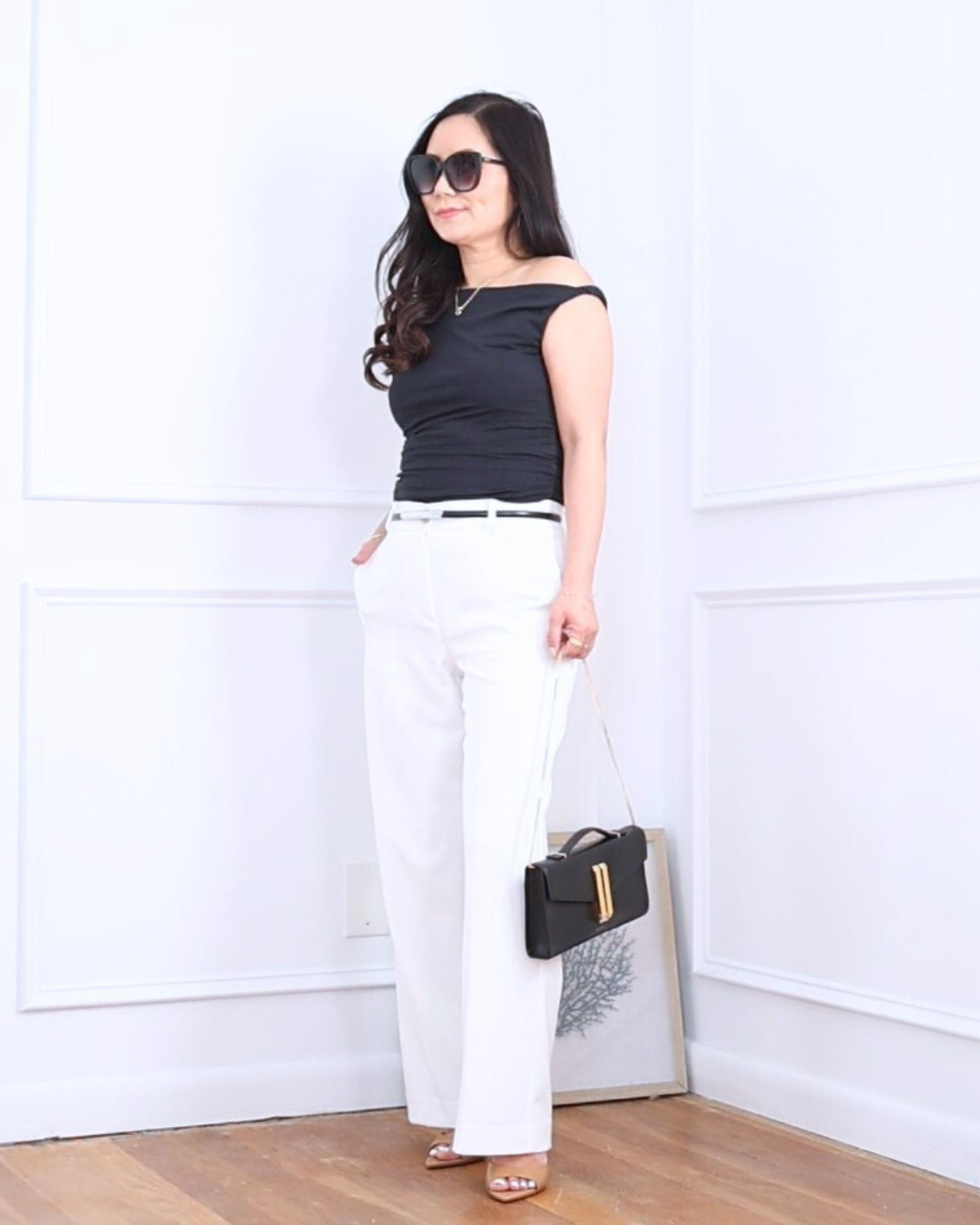 Loved how this asymmetrical twist top adds a little flair to a simple outfit. Paired it with white pants from Amazon and open toe mules for an easy, polished look! I’m 5’2, wearing size S.

#LTKStyleTip #LTKOver40 #LTKPetite