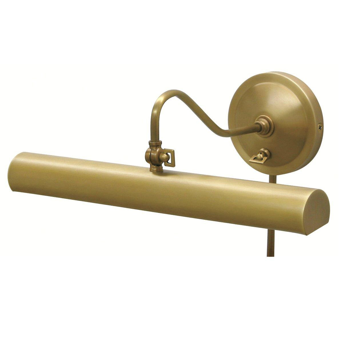 brass plug in picture light with visible cord
