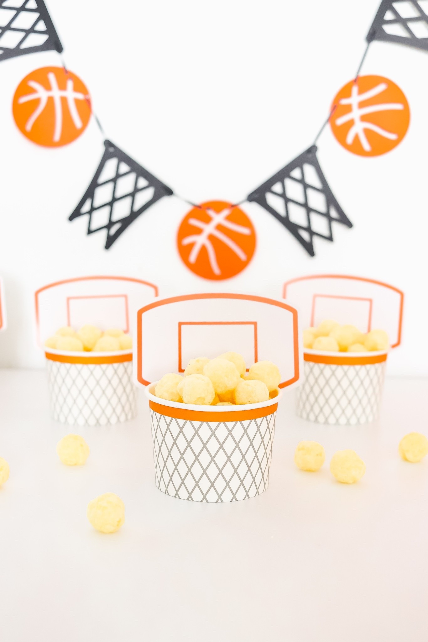March Madness Basketball Snack Cups and Basketball Garland Banner

Basketball party / lesser evil snacks 

#LTKSeasonal #LTKParties #LTKKids