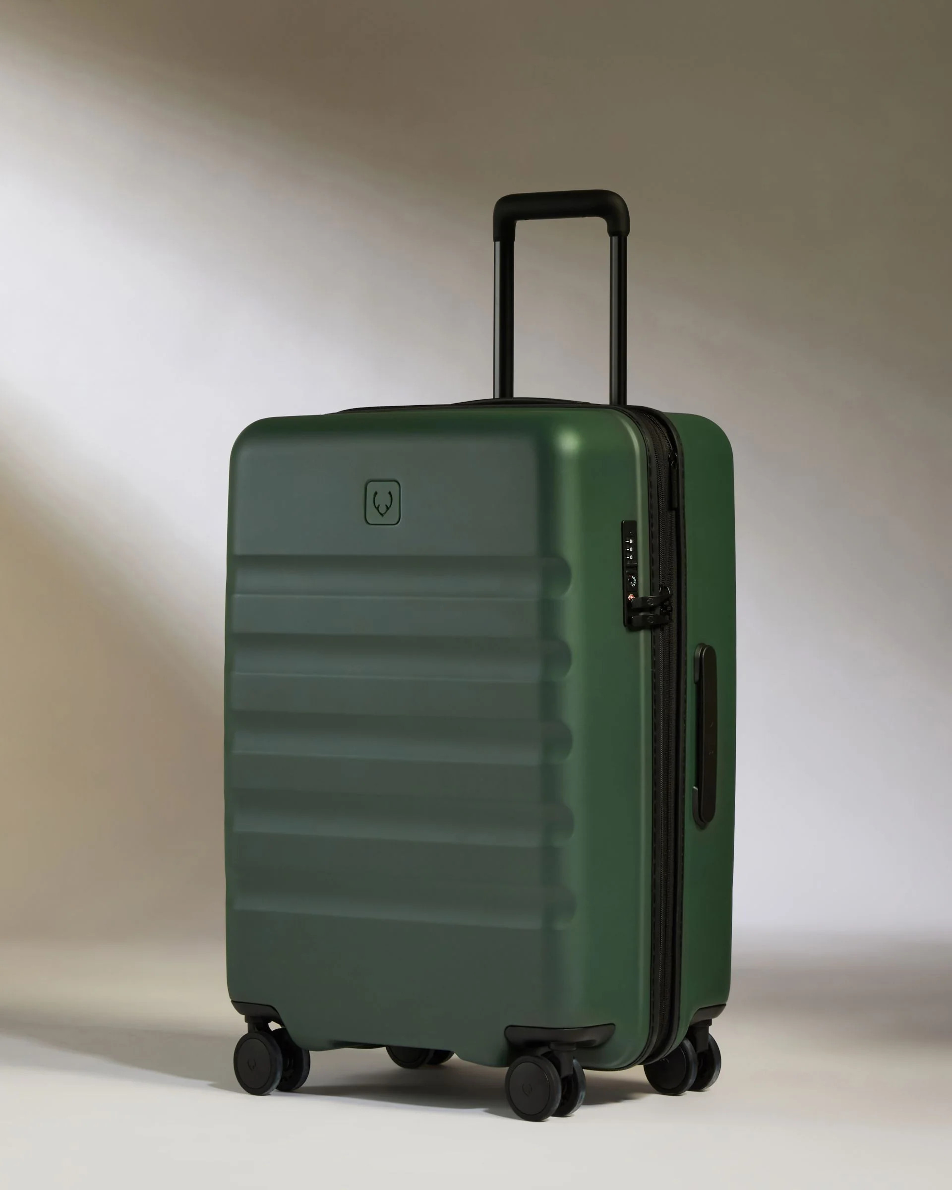 Medium Suitcase in Green - Icon Stripe | Lightweight & Hard Shell Suitcase | Antler USA