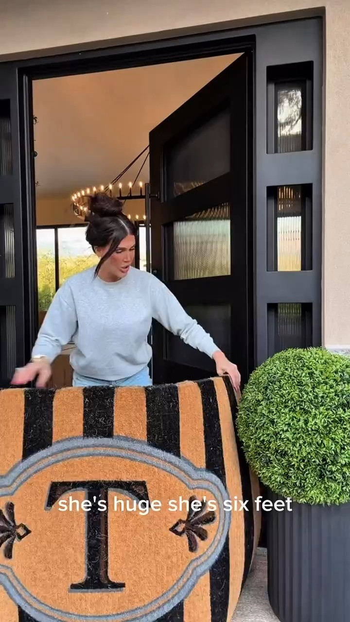 There’s something so refreshing about a simple porch reset. A touch of greenery, an oversized doormat I love, and a fluted vases that do all of the talking 🤍 I love simple decor. 

modern front porch
oversized doormat
fluted vase decor
neutral outdoor decor
simple porch styling

#summerthompsonstyles

#LTKHome #LTKdayinmylife #LTKSaleAlert