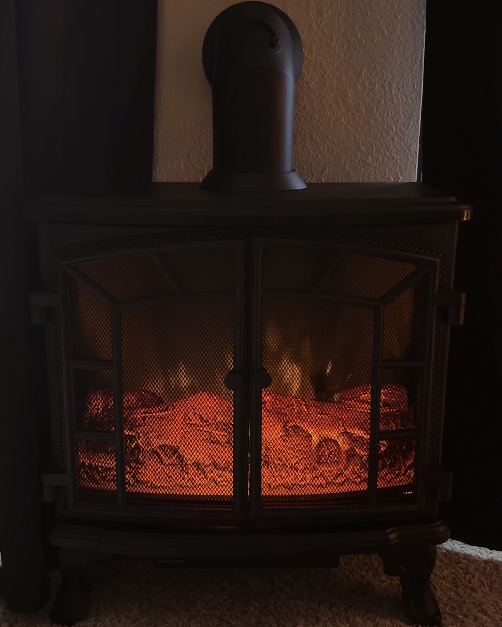 realistic faux fireplace + flue with option heating.


this exact fireplace model and flue are currently out of stock but i listed similar options that i considered purchasing from the same brand. if this model comes back in stock, i will update this listing. 

#LTKHoliday #LTKGiftGuide #LTKHome