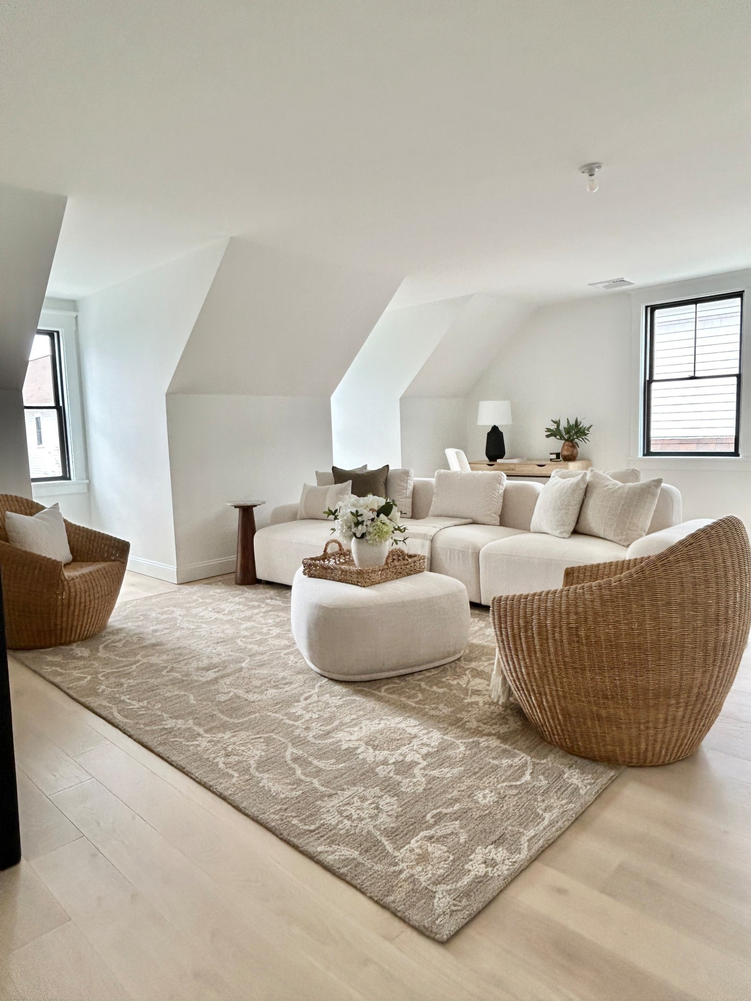 Woven accent chair with white sectional.  Effortlessly elegant family room vibes.

#livingroomstyle

#LTKHome