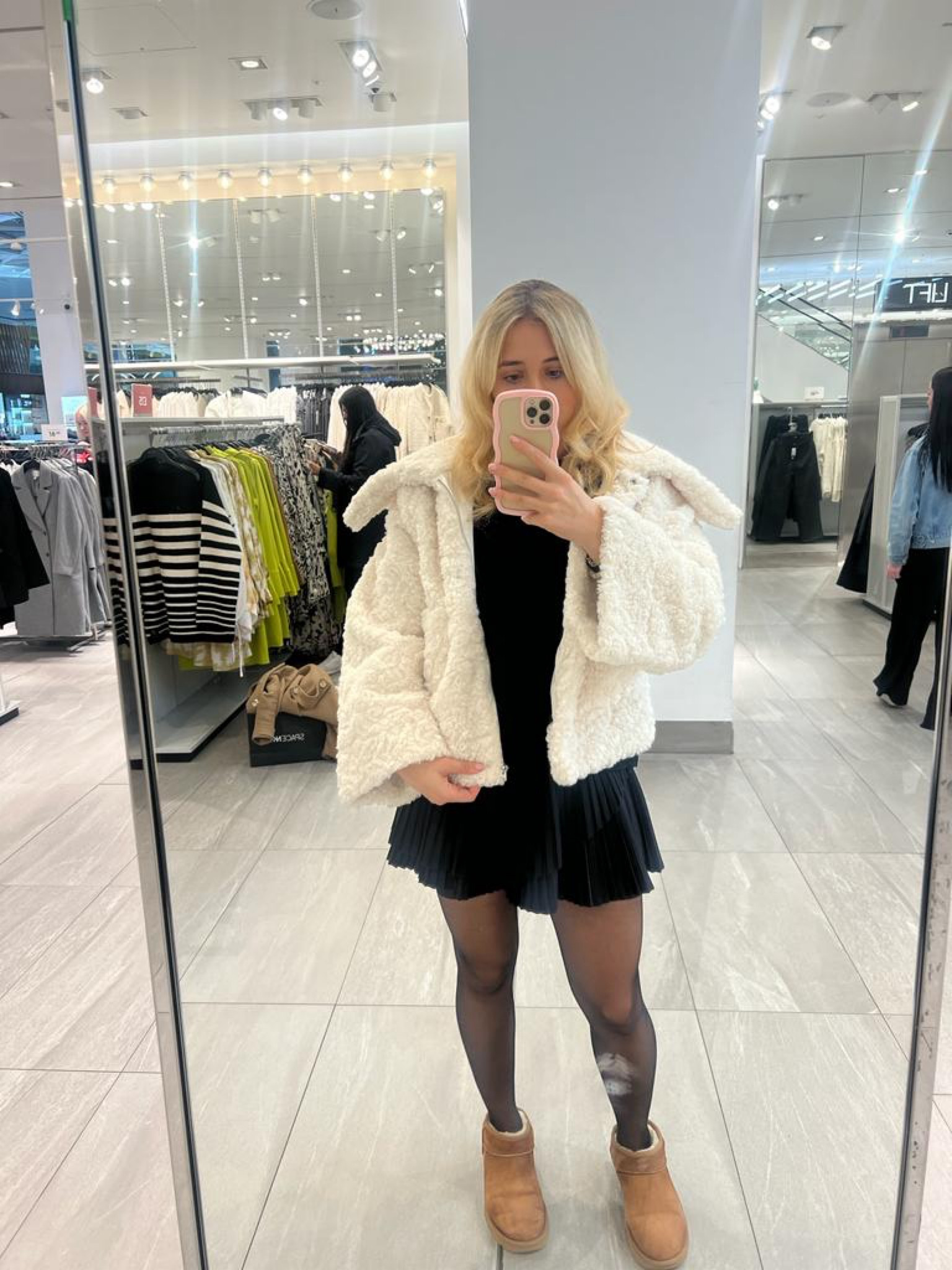Mango pleated leather skirt - H&M fur jacket - teddy coat - fur coat - amazon black tights - amazon iphone case - Ugg boots - Ugg chestnut Uggs - Ugg ultra mini boots

#LTKSeasonal #LTKeurope #LTKstyletip