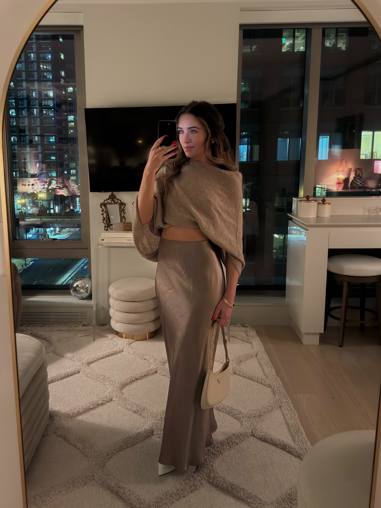 night outfit 🤍
this cashmere poncho from jcrew is so cozy, but lightweight. I tucked it into a belt that I got on Amazon to give it a little crop. Satin skirt is from aritzia

#LTKootd