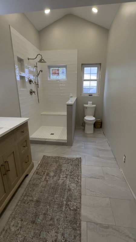 Our bathroom is just about complete! Trim work needs to be done and shower door but nearing the end! Walls are gossamer veil by sherwin williams 

#LTKfindsunder50 #LTKsalealert #LTKhome