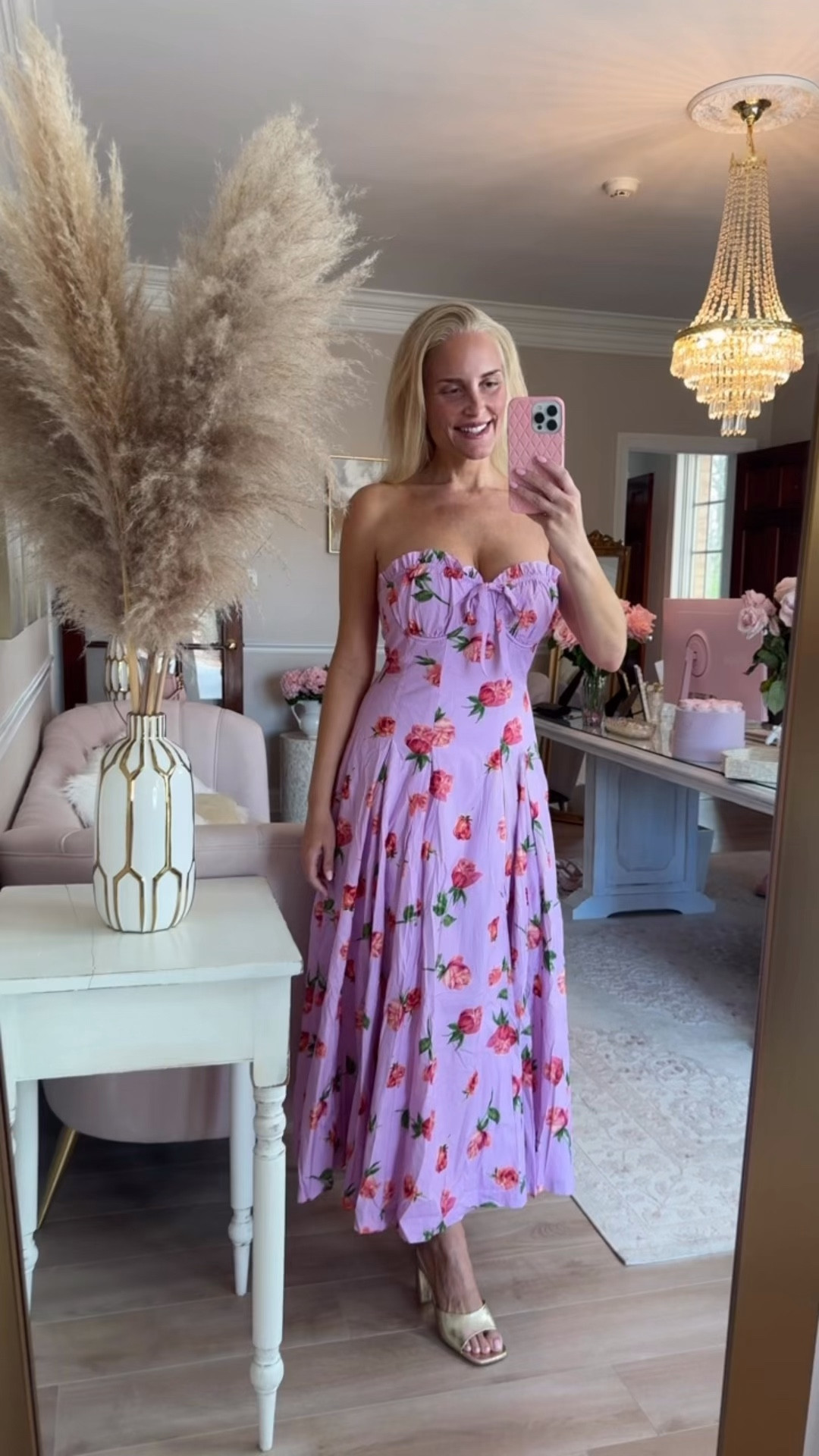 The prettiest dress! Wearing a medium. A little small for 34DD bust. Otherwise such a perfect fit.