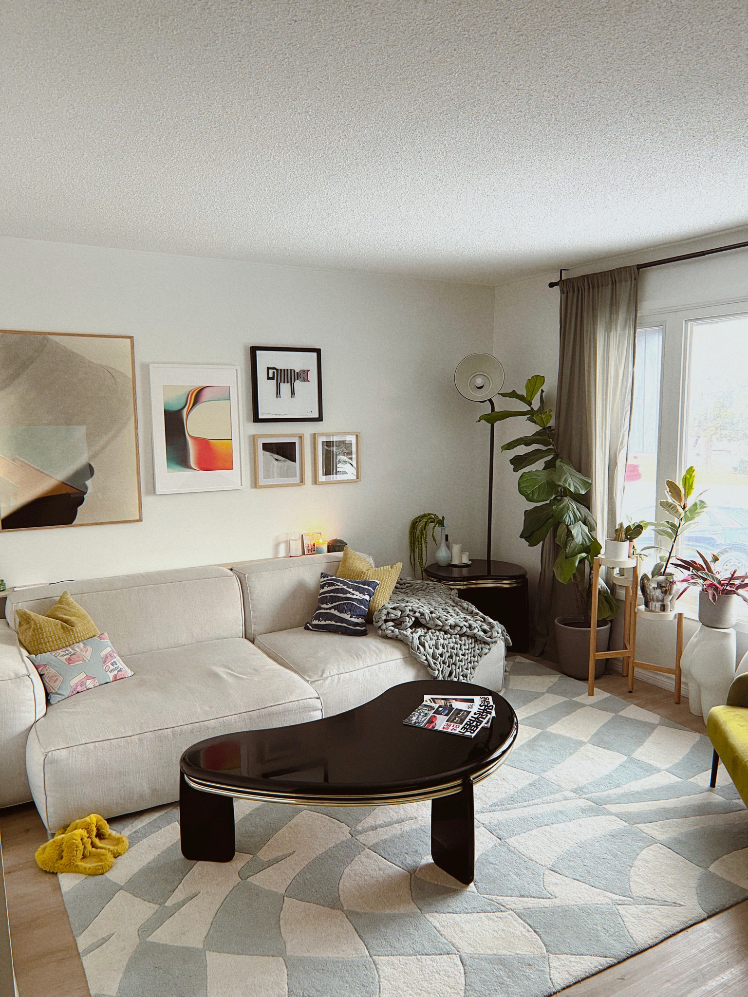 modern living room with checkered rug 

#LTKsalealert #LTKhome #LTKFind