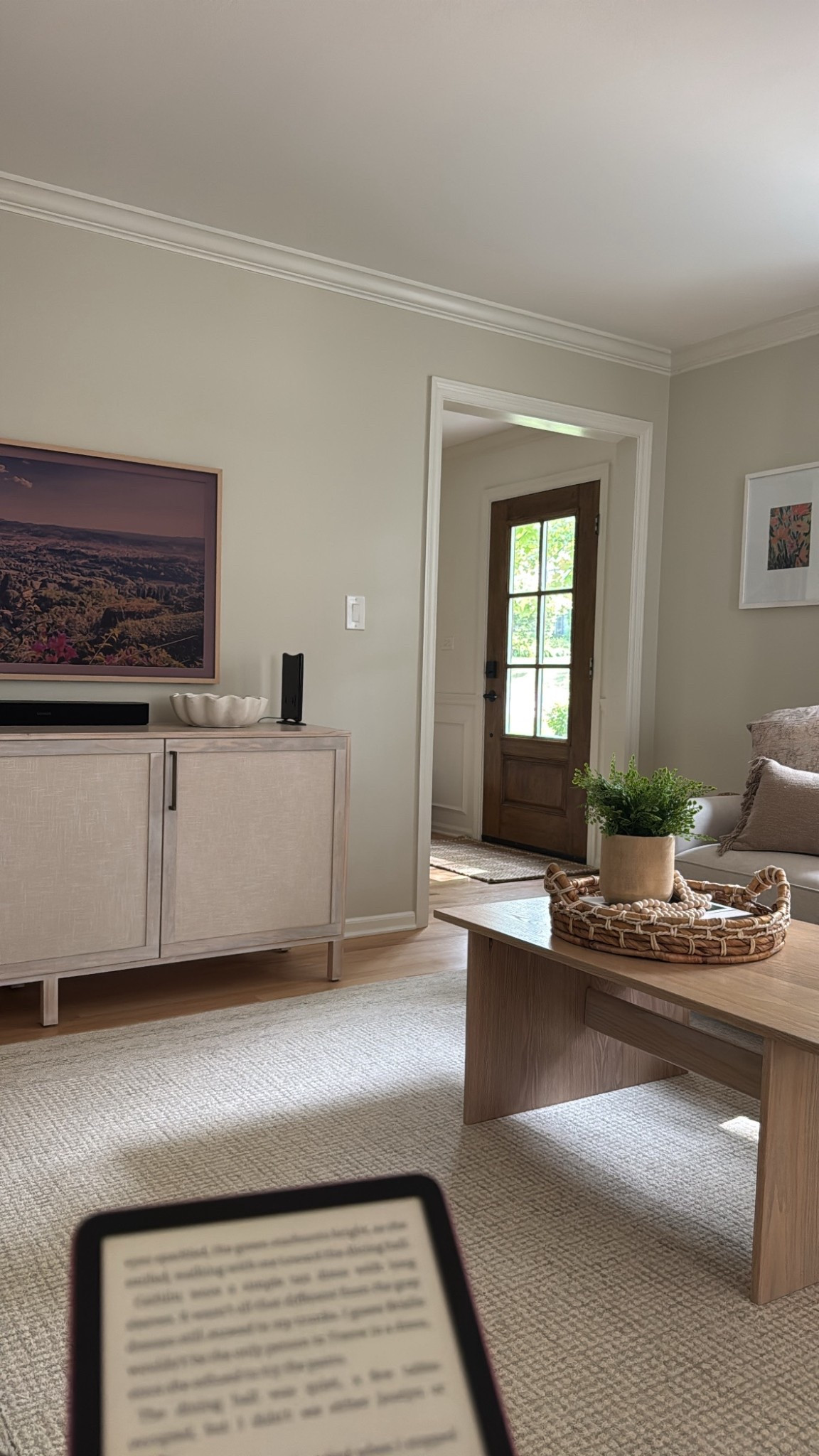 Another reading view. Area rug. Coffee table. Console cabinet. Frame TV. Pillow. Living room decor. Neutral home decor.

#LTKHome