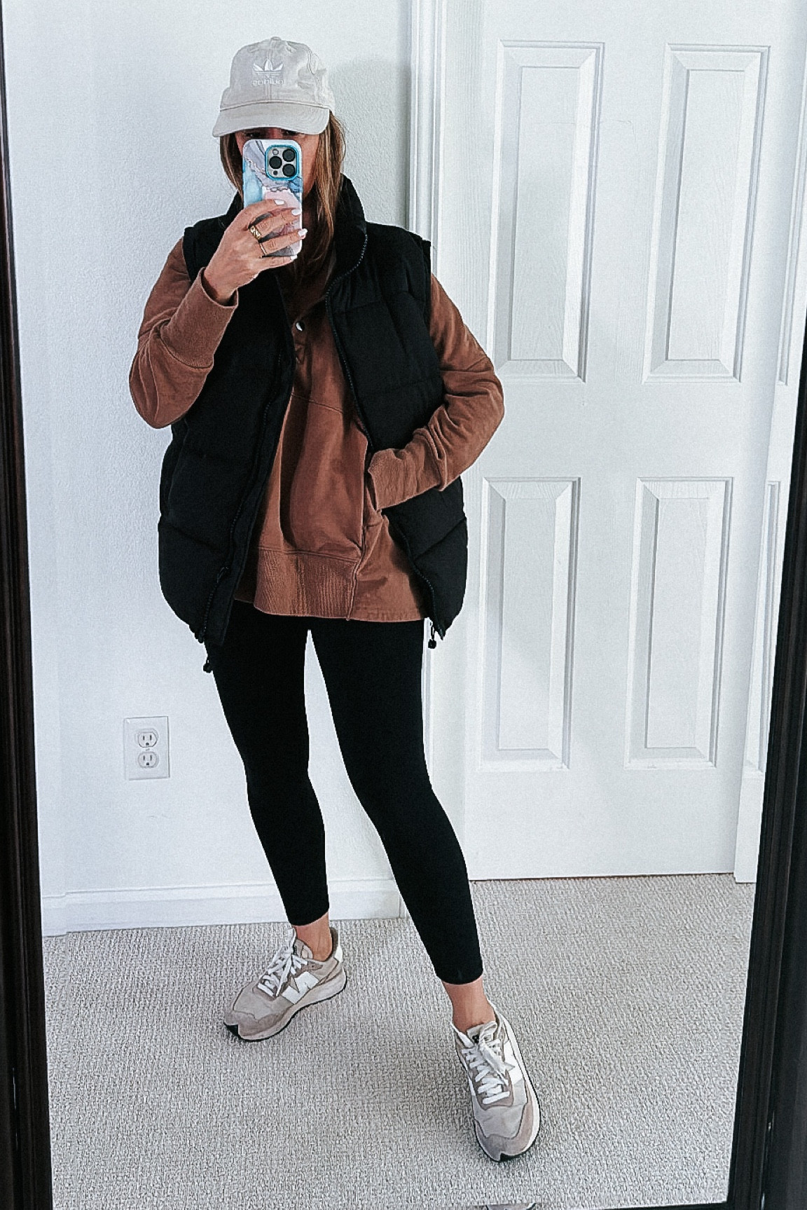 Weekend look with puffer vest best Amazon sweatshirt and Amazon legging lululemon inspired New balance sneakers 