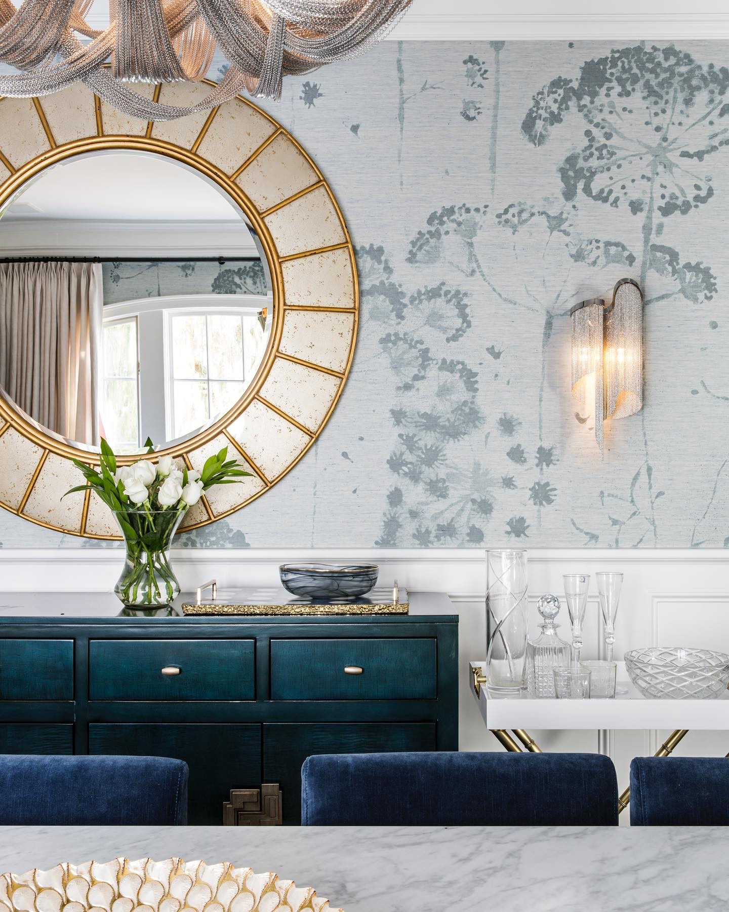 HOME REFRESH 💙 | see how we turned this dark and heavy dining room into a bright and blooming space! The dynamic @phillipjeffriesltd ‘Wish’ wallcovering brings playful large scale blooms into the space with an immersive mural printed on natural grasscloth. @knofdesign #roomrefresh #homemakeover #knofdesign #blueroomideas #coolblue 

#LTKU #LTKHome #LTKPlusSize