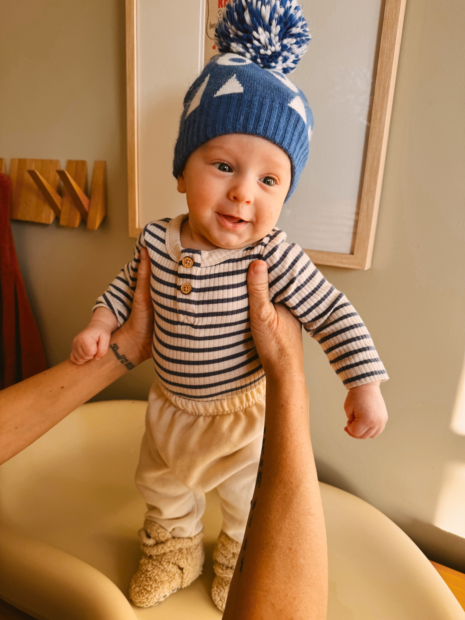 Are you even real? I love this blue striped onsie and his fuzzy booties! 

#LTKKids #LTKBaby