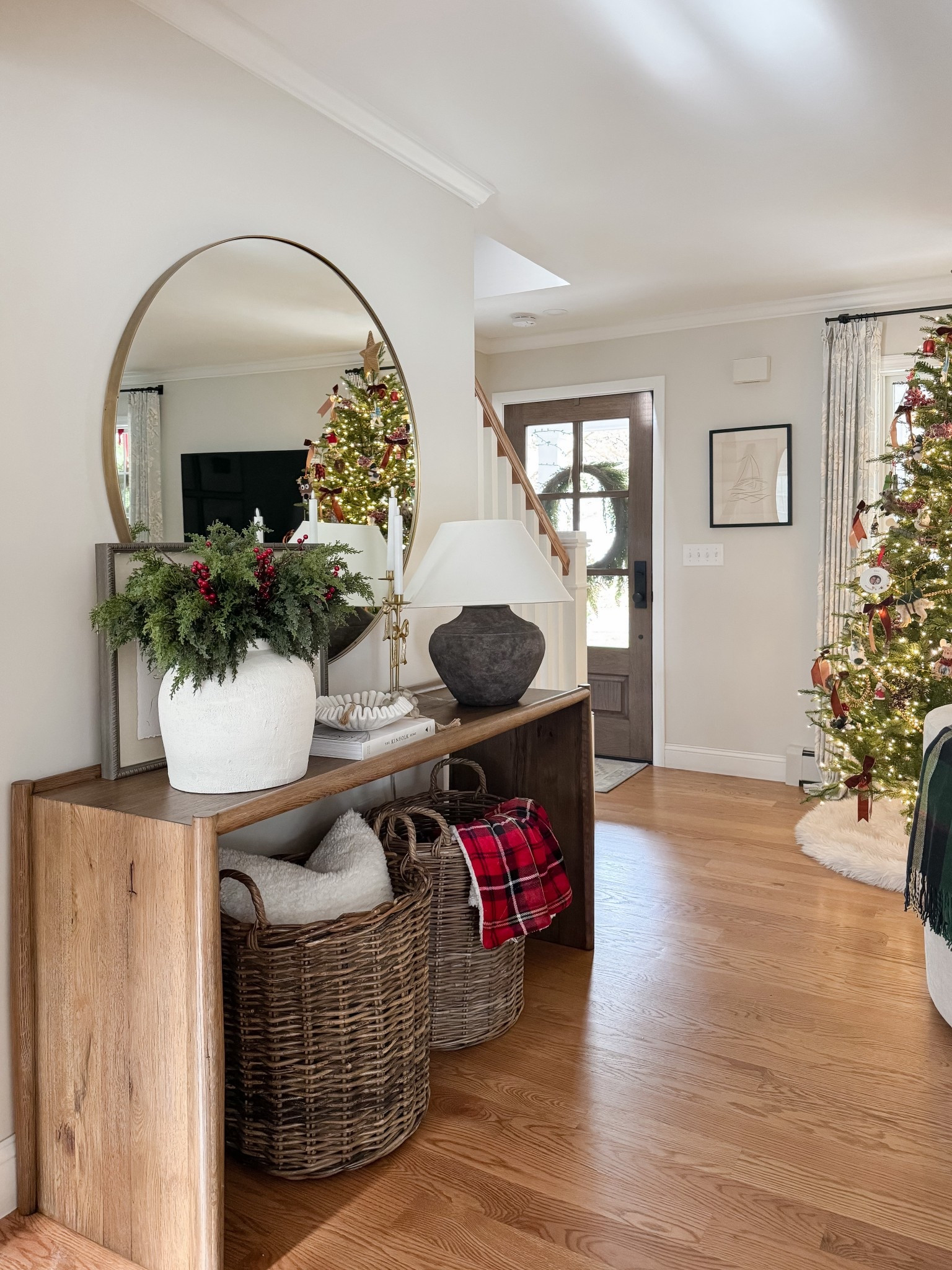 Holiday Entryway

Wooden console table, woven basket, knit throw blanket, basil candle, book stack, marble bowl, terracotta vases, faux stems, beaded garland, Sherri calnan home

#LTKHoliday #LTKHome