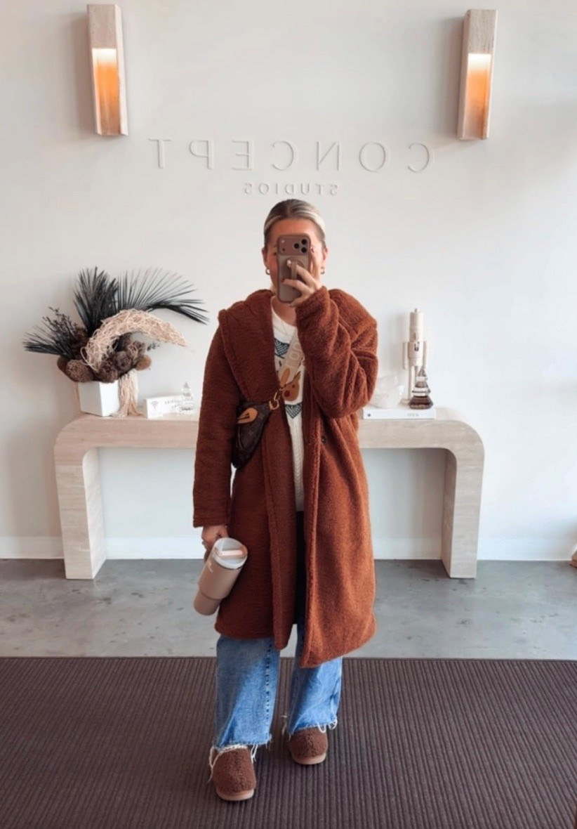 This fuzzy fleece coat is like wearing a cozy blanket! The hood adds extra warmth and the pockets actually fit my phone and keys. Long enough to keep me completely warm but still looks cute. I throw it over everything from pajamas for school drop off to jeans for running errands. The faux fur is so soft and luxurious! 

 #FuzzyCoat #WinterCoat #LTKSeasonal #CozyStyle #FleeceJacket #LTKFindsUnder100 #LTKdayinmylife #LTKHoliday #LTKgrwm