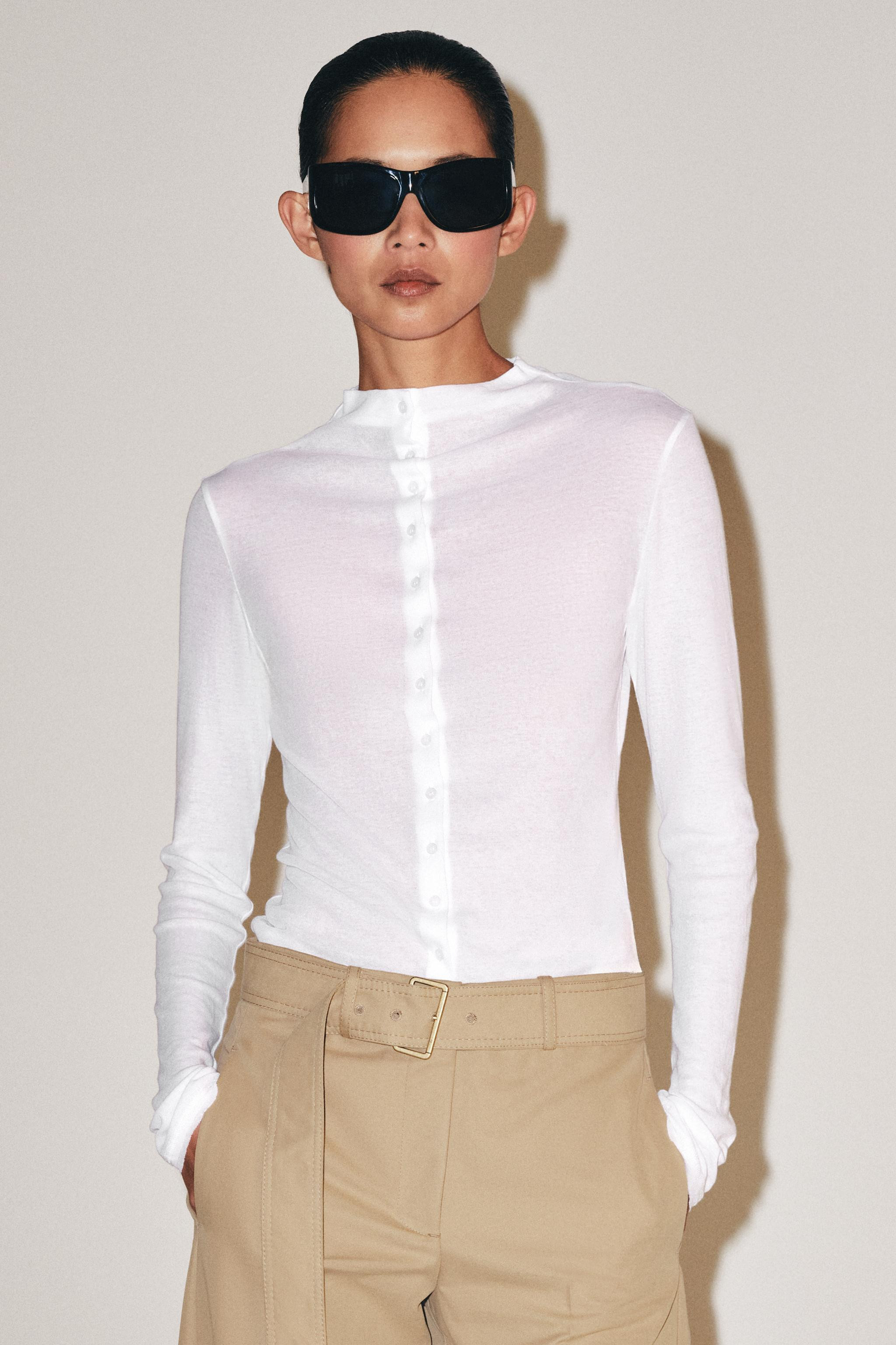 SLIM FIT - HIGH NECK - STANDARD HEM - LONG SLEEVE. T-shirt made from 100% cotton fabric. Features... | Zara US