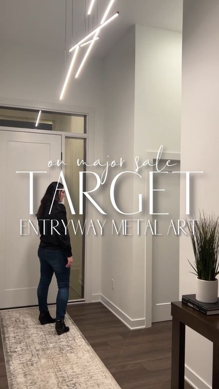 Easy accent wall DIY with target wall art on major sale. I wanted to really showcase our 12 ft ceiling in our entryway, so I got 6 of these metal wall art pieces from Target and layered them together for one seamless look. I'm loving how it turned out!

#LTKVideo #LTKHome #LTKSaleAlert