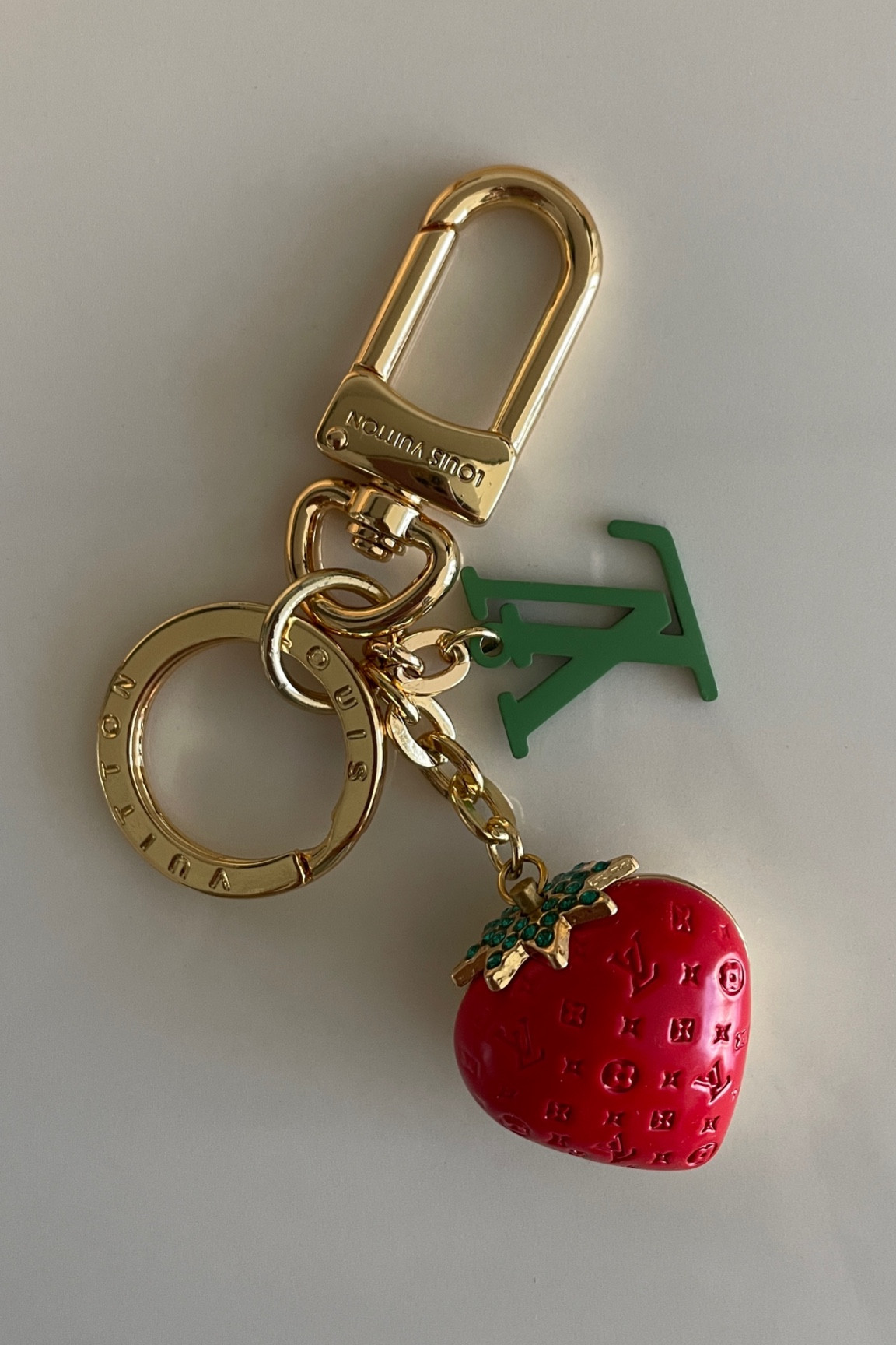Strawberry Louis Vuitton keychain dhg 😍🍓

#LTKfindsunder100 #LTKfindsunder50 #LTKsalealert
