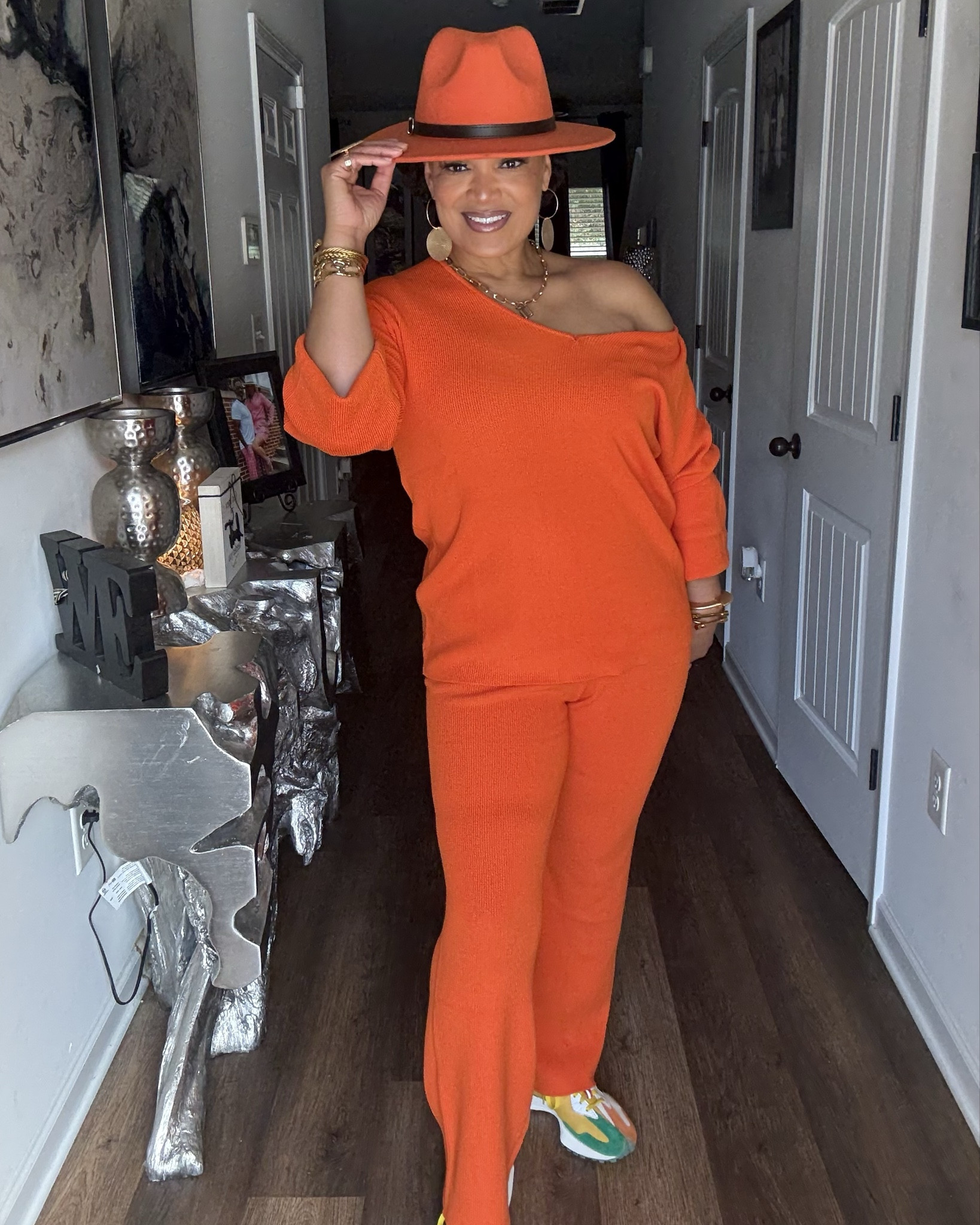 This vibrant orange set is so soft, comfortable, chic, edgy and can be styled in various ways!!  #fedora #hat #orange #fall #twopieceset #ootd #fall #fashion #trendy #edgy #chic #affordable #vibrant #stylish #travel #offshoulder #budget #Statement 

#LTKFindsUnder50 #LTKMidsize #LTKStyleTip