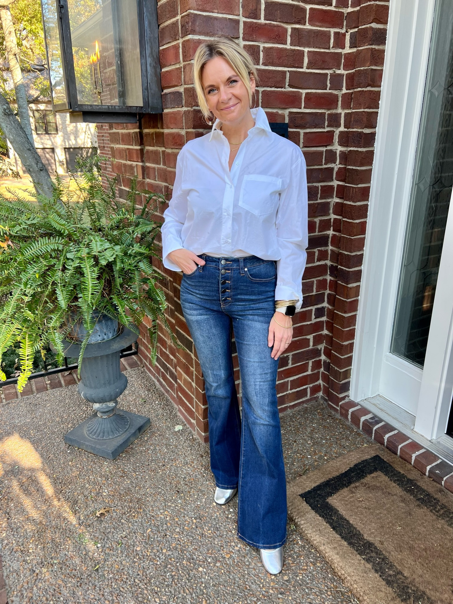 Classic white button-up with flare jeans…. Plus a sprinkle of silver 🤍.  A fun look for your upcoming casual Christmas party!

#LTKstyletip #LTKSeasonal #LTKHoliday