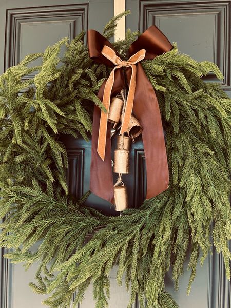 Front door Christmas wreath 
Norfolk pine, ribbon, bells, Christmas decor 

#LTKhome #LTKHoliday #LTKfindsunder100