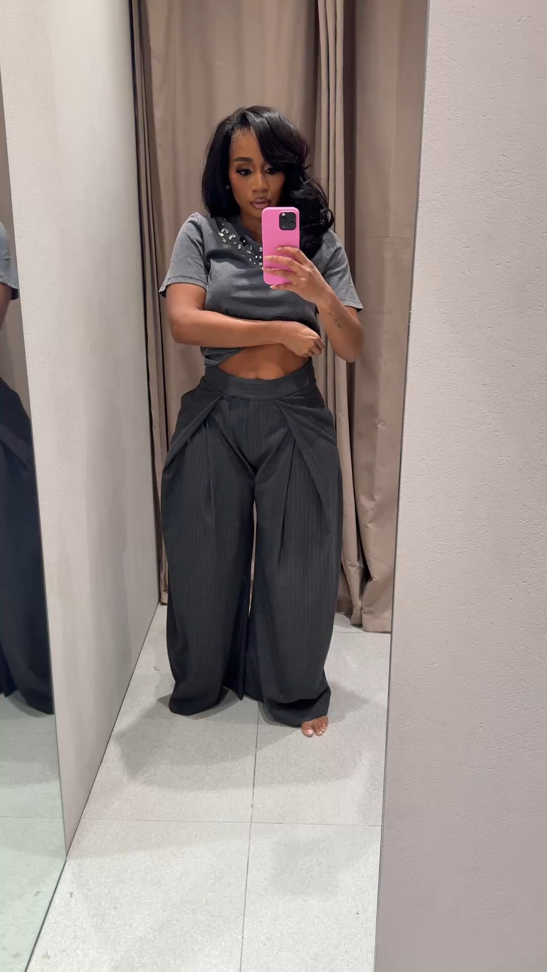 Pinstripe pleated flare leg pants paired with a jewel top for an elevated casual look or workwear style inspo!

#LTKWorkwear #LTKFindsUnder100 #LTKStyleTip