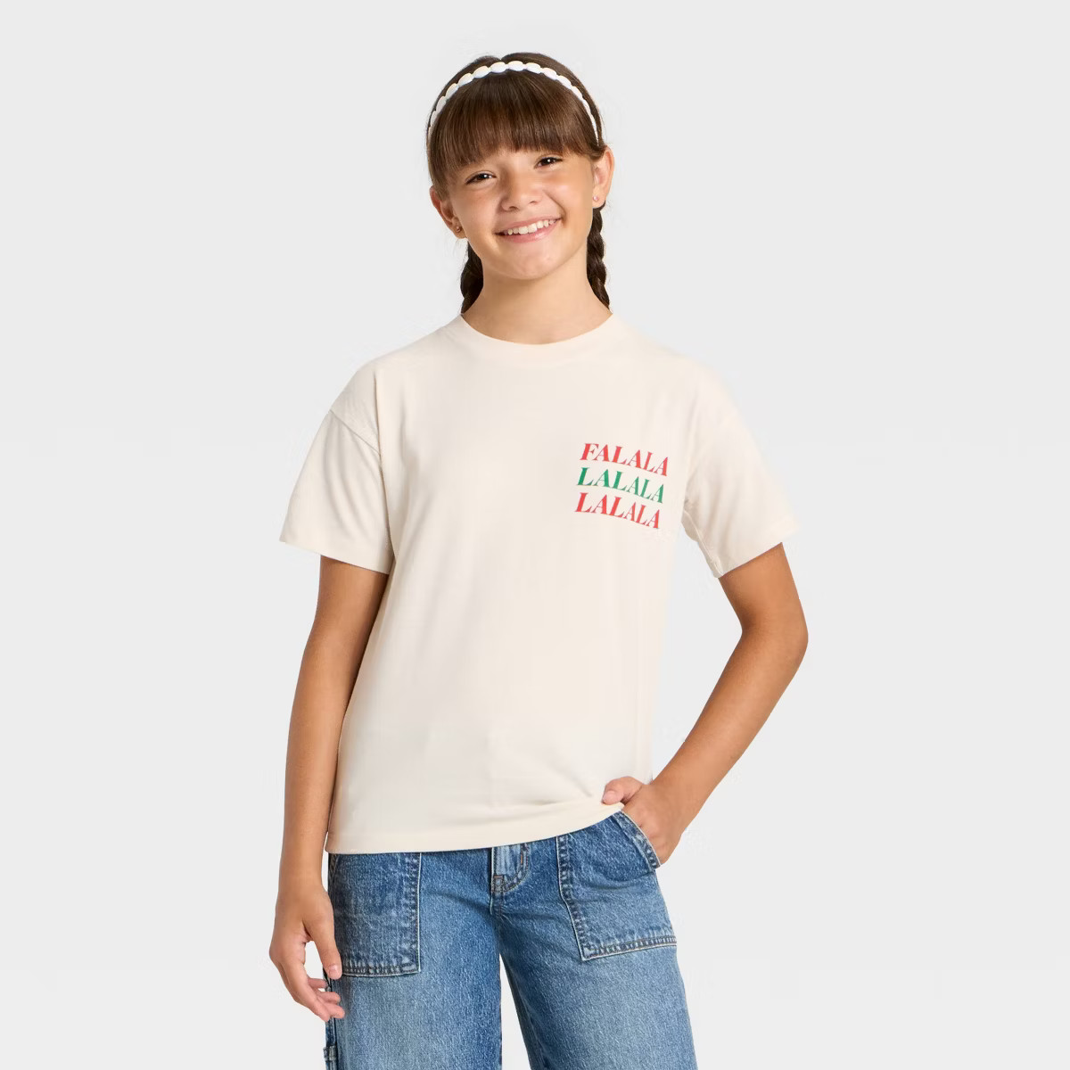 Girls' Short Sleeve Christmas 'Falala' Oversized Graphic T-Shirt- Cat & Jack™ Beige | Target