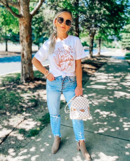 Code: BLONDEBELLE to save on my graphic tee + jeans 🫶🏻 
.
.
.
Spring outfit, summer outfit, distressed jeans, graphic tee, sunglasses, backpack, booties, bracelet 

#LTKstyletip #LTKunder50 #LTKunder100