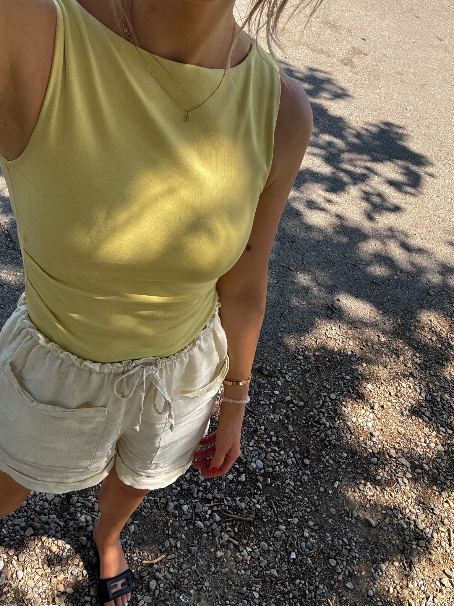 Butter yellow all summer 

Top is Zara, in small—has a cool hemline (4424/311/300)
Shorts are old Zara linen, so linking similar below (sorry!!)