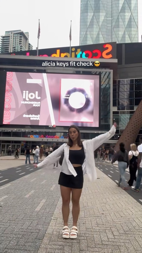 Casual summer outfit for an Alicia Keys concert at Scotiabank Arena in Toronto. Wore a black mini skirt from American Eagle paired with a black square neck tank top from Babaton Aritzia, as well as a white linen shirt from Abercrombie and white sandals from L’Intervalle. 

#LTKstyletip #LTKunder50 #LTKxNSale