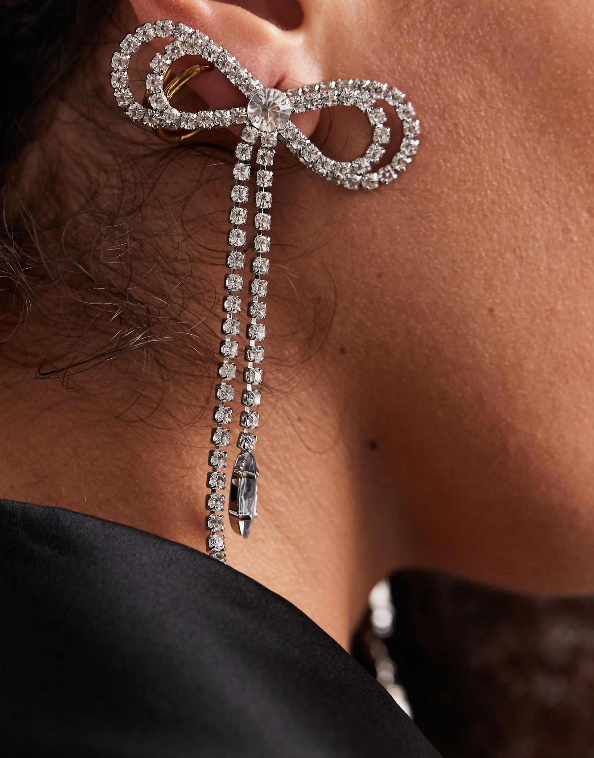 ASOS DESIGN stud earrings with diamante bow design in silver tone | ASOS | ASOS (Global)