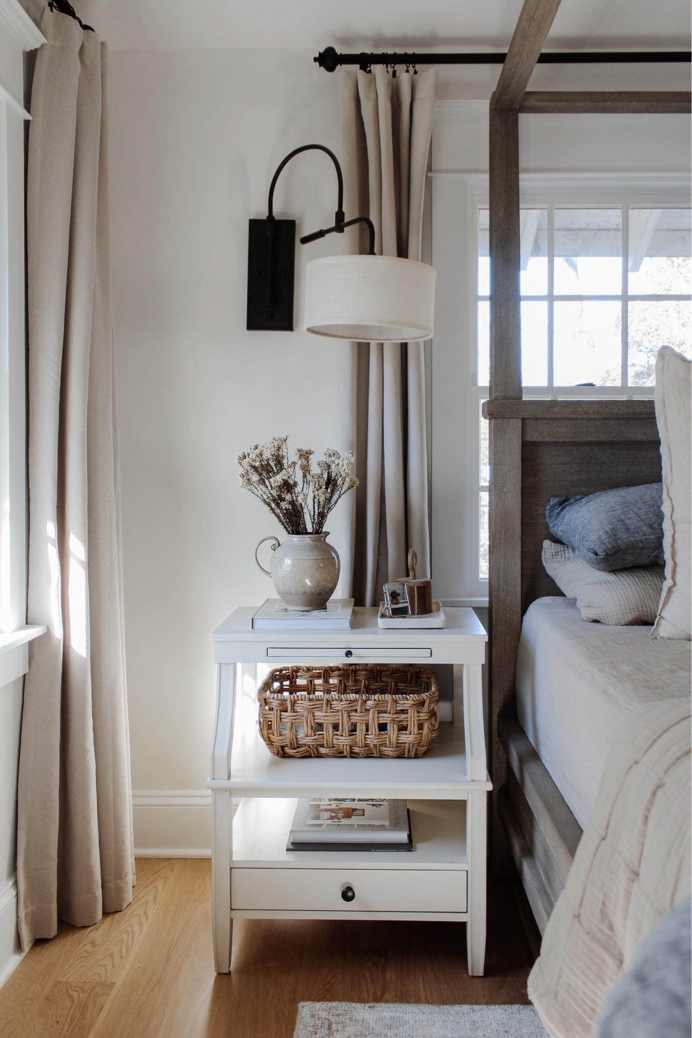 Feeling reenergized by new spaces to slowly style ✨ These new dried stems and a few other favorites at the moment are being shared on the blog today! Head to stories to see + read my reviews 🤍
•
Shop my bedroom and much more from the link in bio, too! Message me with any questions. Thanks for following along!
•
•
•
dried florals, spring home decor, floral stems, nightstand styling 4 poster wood bed, natural tone wood bed, canopy bed, linen duvet, stripe euro shams, floral decorative pillow, bed pillows, pillow inserts, cotton gauze quilts, layered bedding, nightstand decor, white two shelf nightstand, affordable furniture, quick ship furniture, swing light, nightstand wall light, affordable curtain, neutral bedroom, bedroom decor, black curtain rod, vintage decor, Target home, woven basket, lumbar pillow, floral throw pillow cover, blue bedding  

#LTKstyletip #LTKhome #LTKsalealert