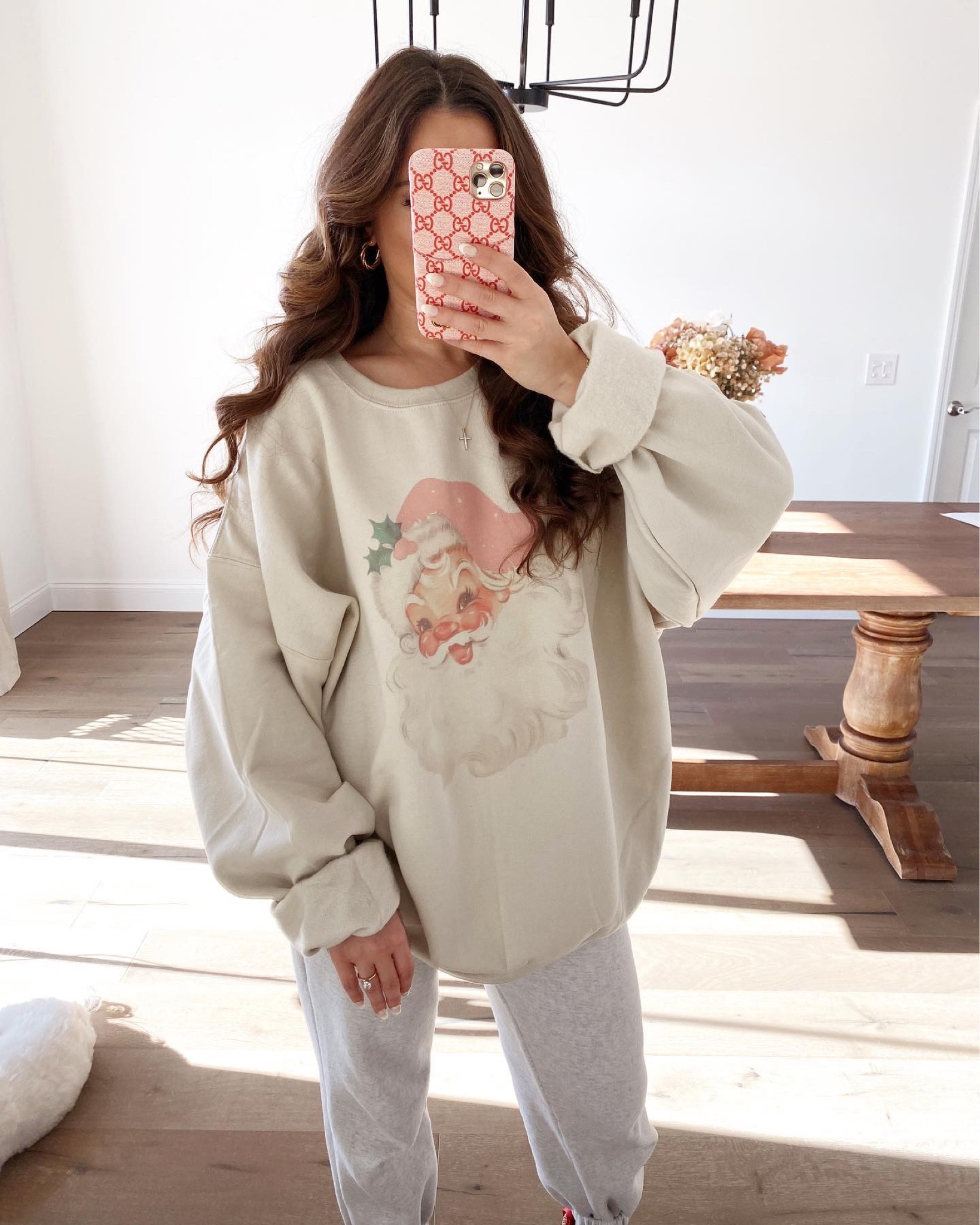 Santa oversized crew sweatshirt. Wearing a size large. So cute for the blush pink gala  

#LTKHoliday #LTKSeasonal #LTKsalealert