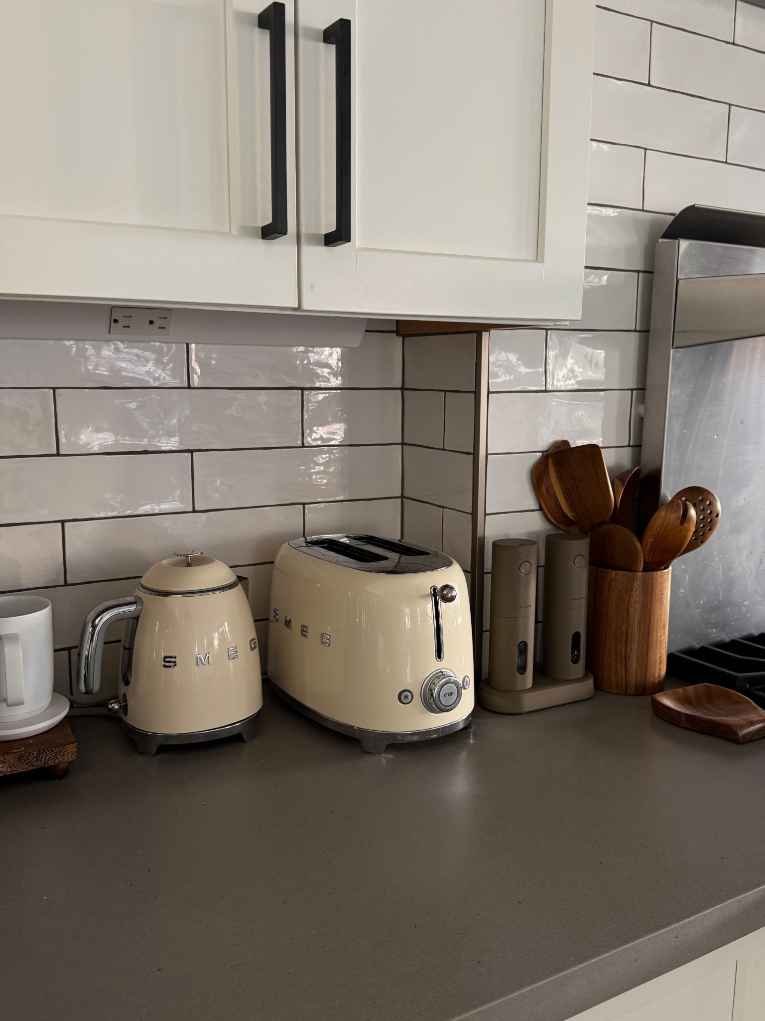 Kitchen things that make me happy. Smeg toasters, jazzupco wooden utensils, salt and pepper grinder, ember mugs, wood spoon utensil holder. 

#LTKHome