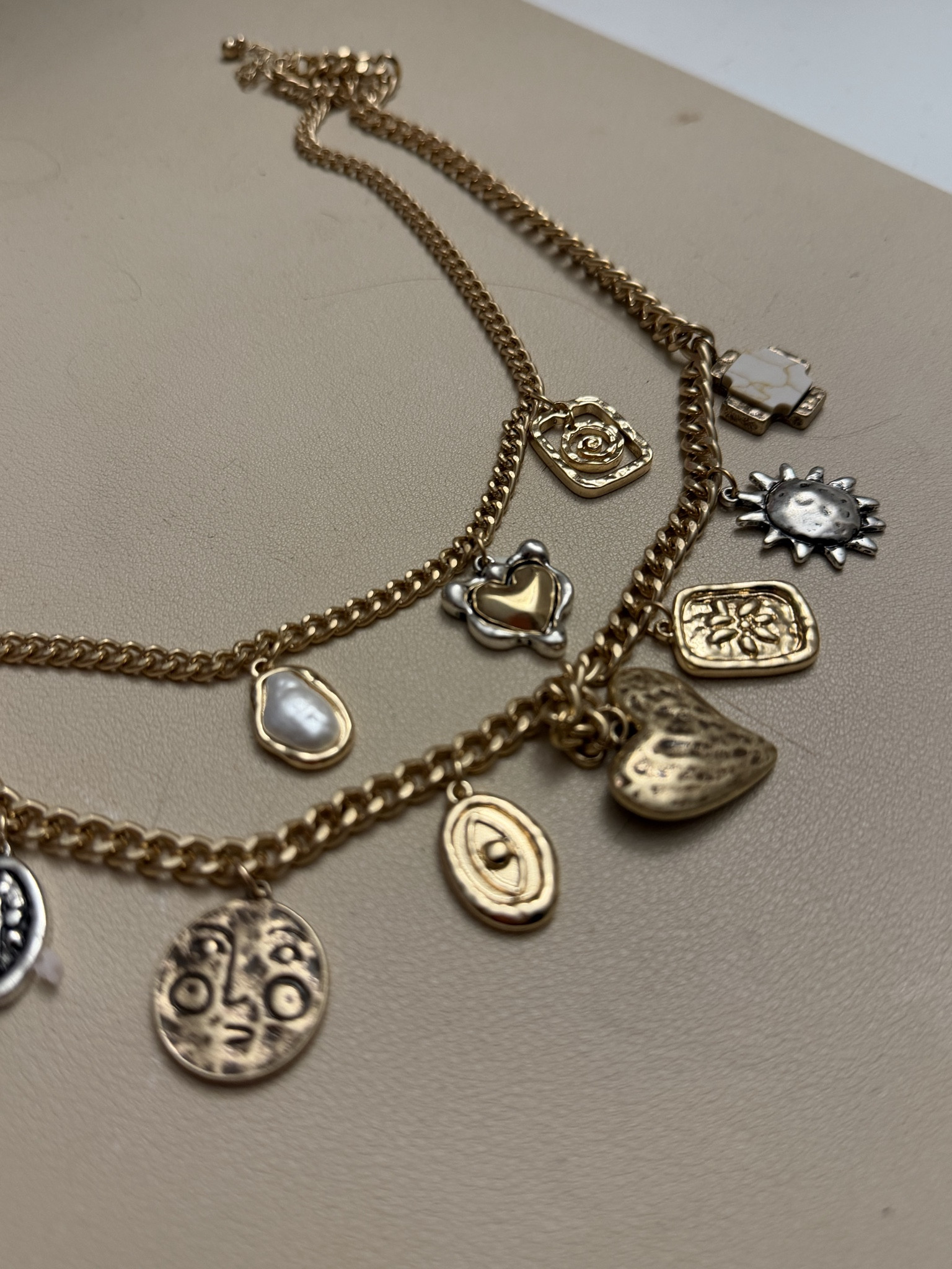 Charm necklaces are so cute !! Love this one that goes with everything 

#LTKmomlife #LTKootd #LTKWorkwear