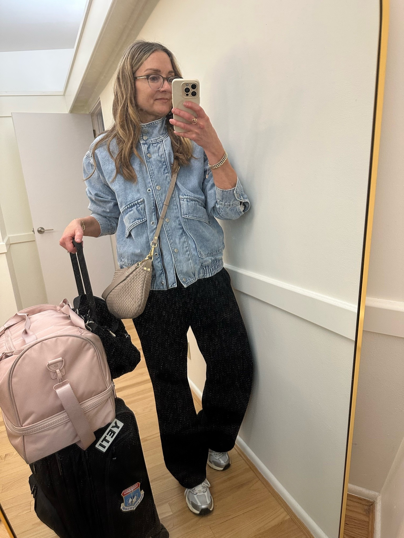 Travel outfit for my flight to England!

@gapstyle denim bomber, @Aritzia  wide leg sweats, @CALPAK carryon bag, @newbalance sneakers

#LTKTravel #LTKOver40 #LTKootd