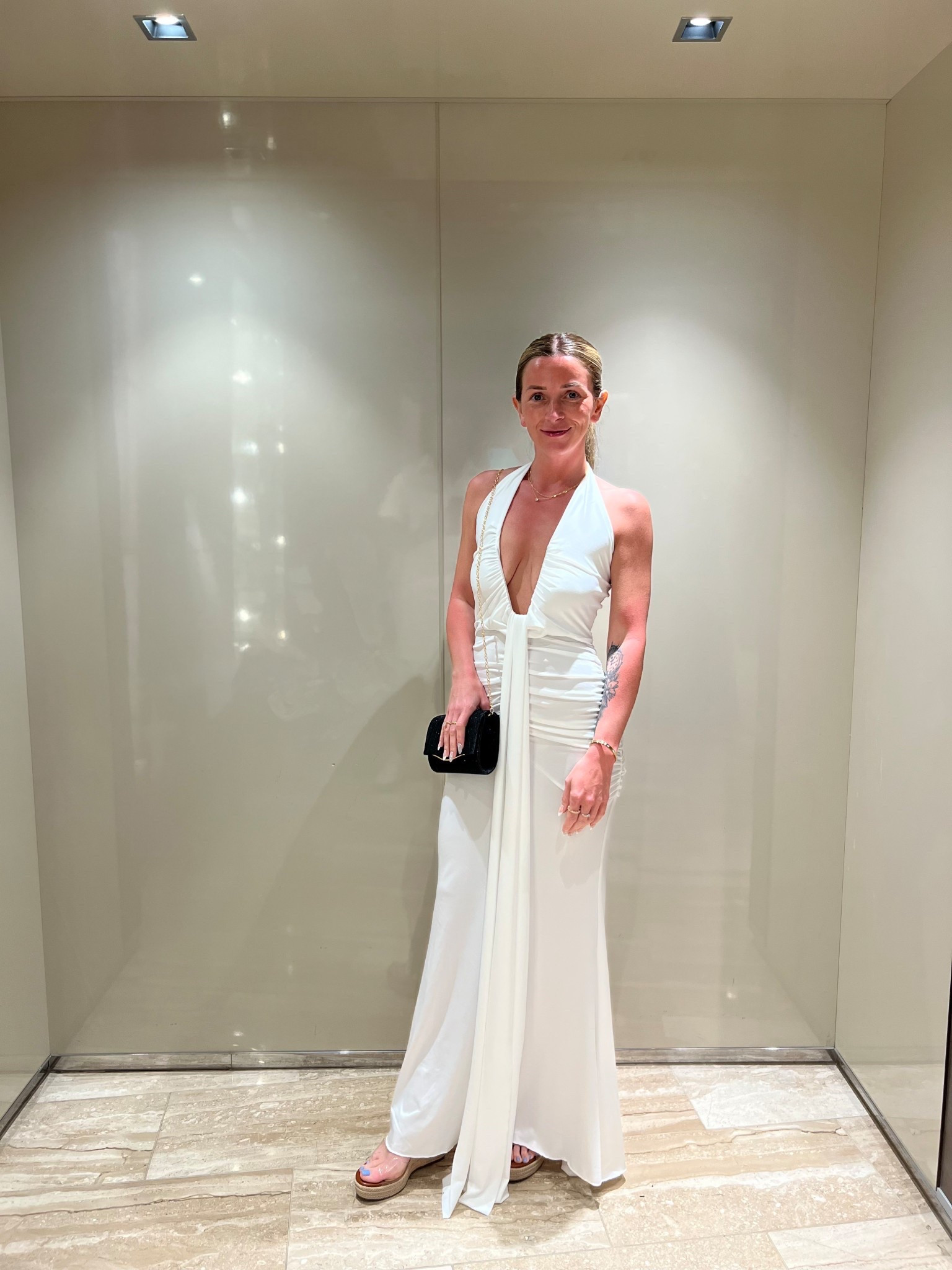 My white night cruise dress 🤍 This ruched halter maxi is SO flattering with the plunge neckline, open back, and body-hugging stretch fabric. Perfect for cruises, beach dinners, bridal events, or any summer night you want to feel a little extra.

#LTKWedding #LTKootd