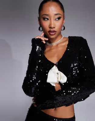 Kaiia exclusive x Sasha Corte exclusive sequin contrast bow tie front top co-ord in black | ASOS (Global)