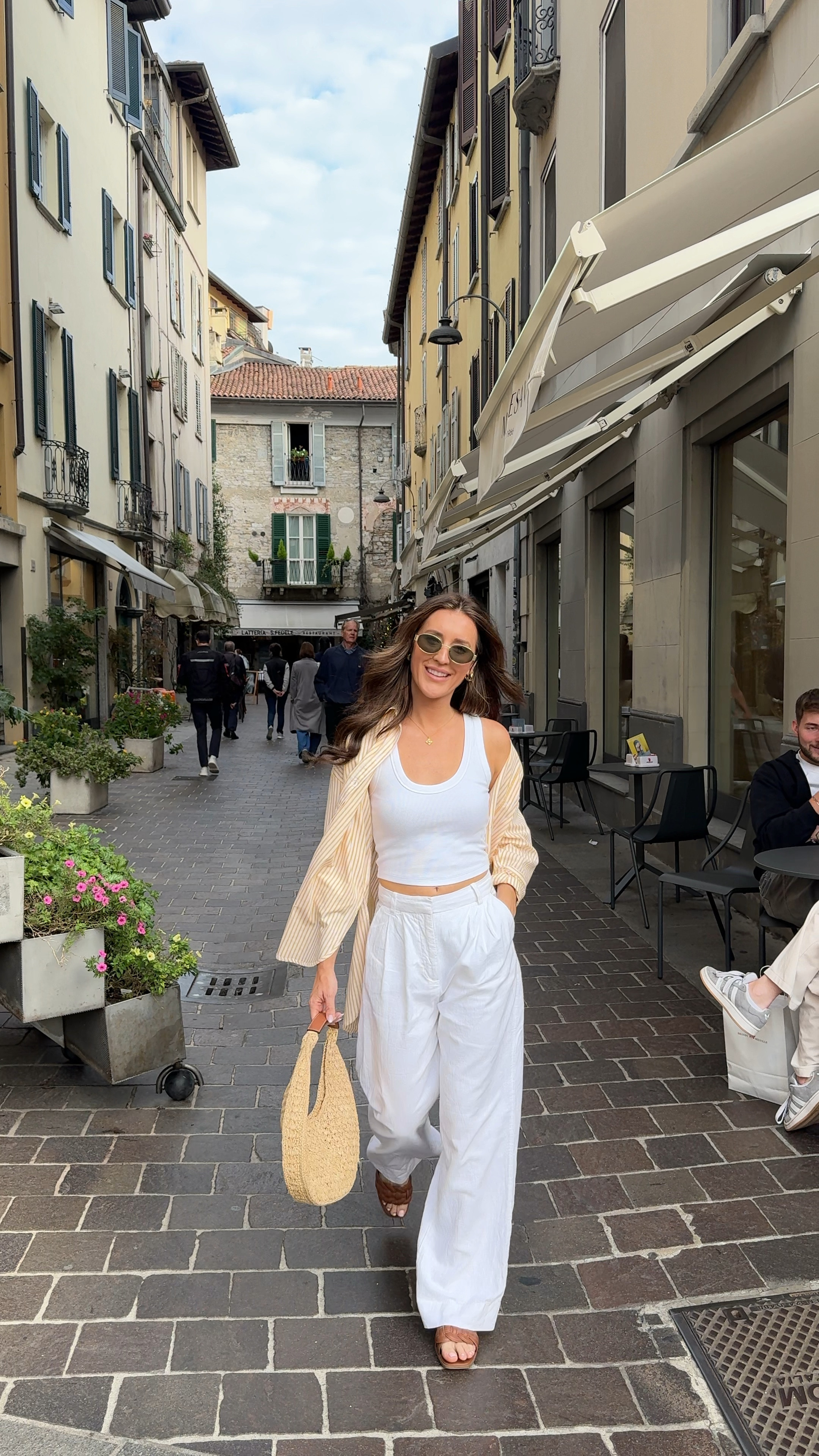 All white look- Linen pants and tank! Striped button runs oversized but I got my true size. Europe, Italy 

#LTKTravel #LTKVideo #LTKStyleTip