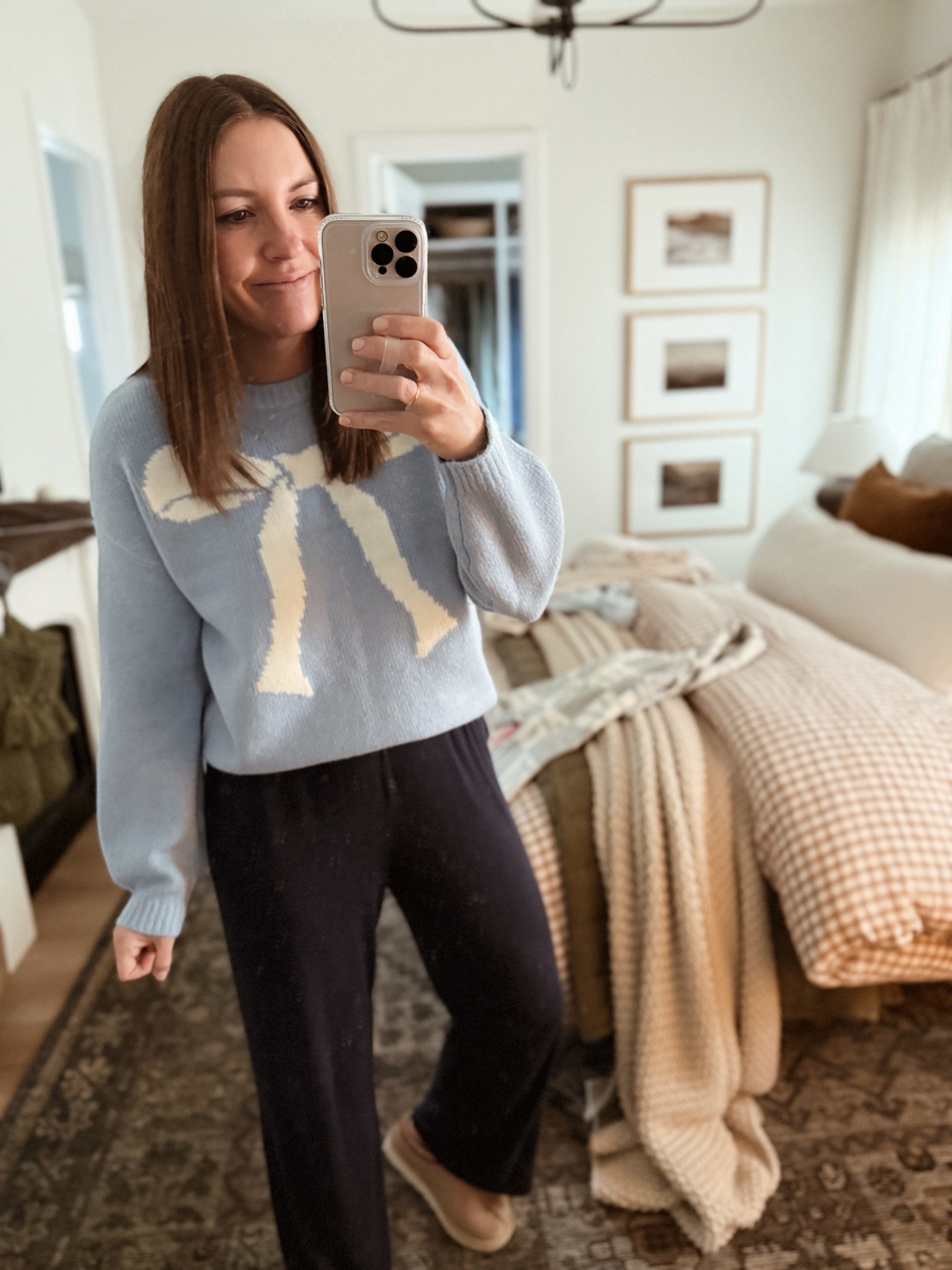 $25 bow sweater in blue! Available in all sizes!

#LTKStyleTip #LTKFindsUnder50 #LTKHoliday