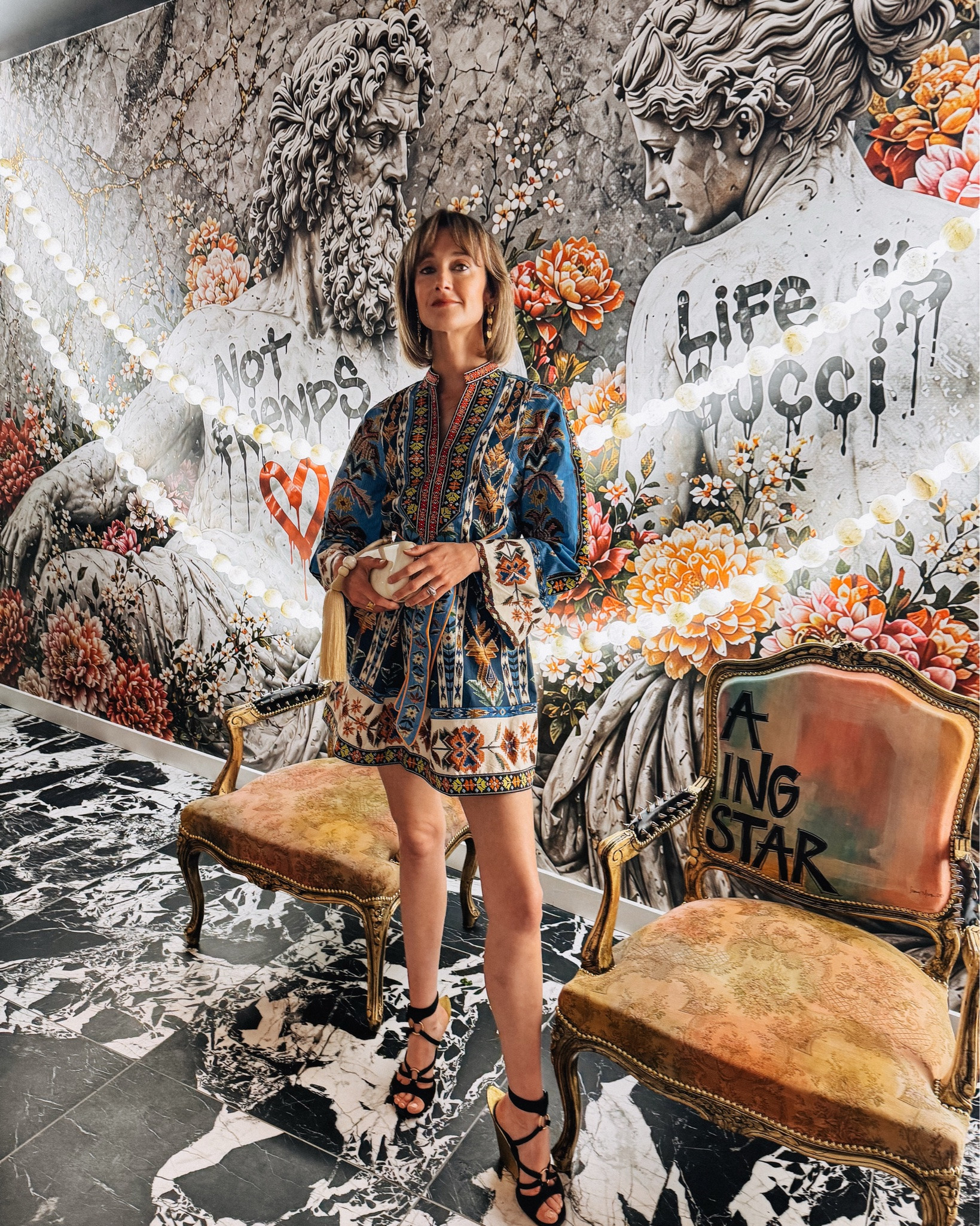 A printed mini dress for a fun night out at a new Latin restaurant. Styled with a tassel clutch and wedge heels.

#LTKootd #LTKSeasonal #LTKOver40
