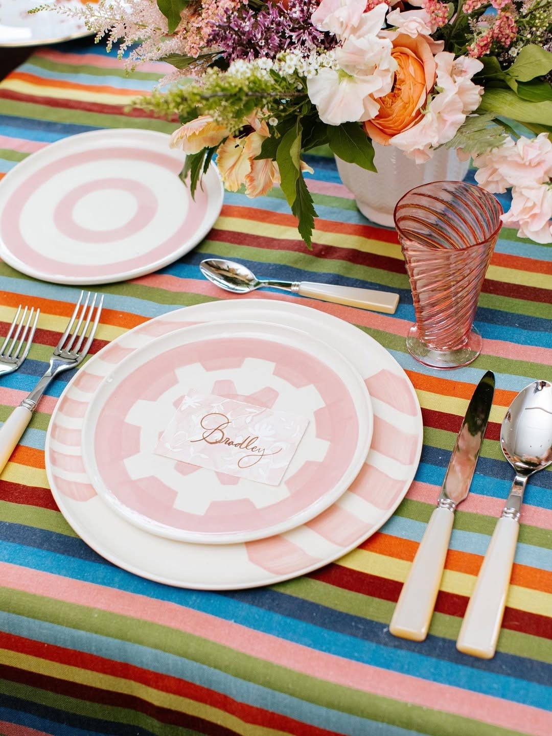 Lined up for lunch in summer stripes 💐 Mixing pastels and florals for the ultimate Tablescape moment. Shop the colorful setup!

#LTKFindsUnder100 #LTKFindsUnder50 #LTKHome