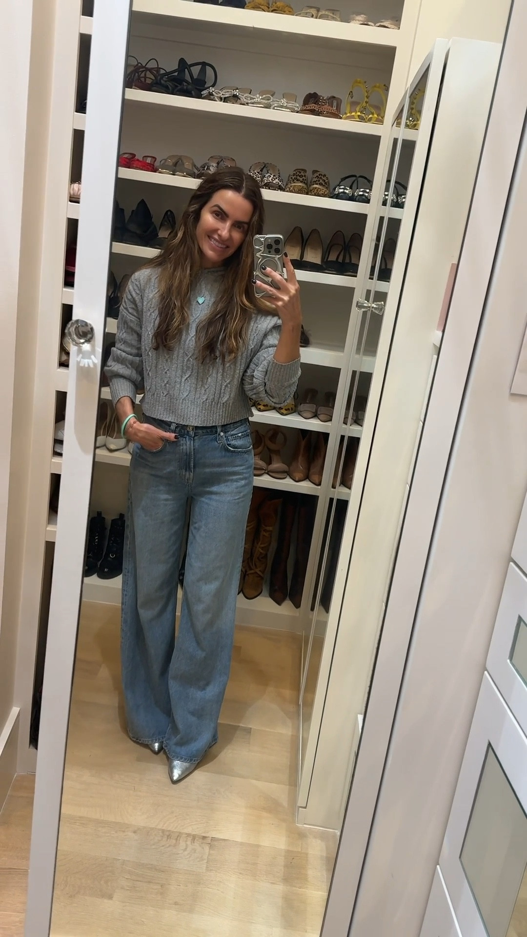 shop my casual chic #ootn for gno wearing my fav vintage tank (runs small size up im wearing M), cool girl, relaxed denim u need, best bag & booties too! 

jeans are as comfy as the sweatpants jeans but a little dressier…run tts im wearing a 25

+ shop my cable knit sweater thats the perfect gift & a favorite for older days or nights (& pants that are 30% off rn)! 


#LTKGiftGuide #LTKSaleAlert #LTKCyberWeek