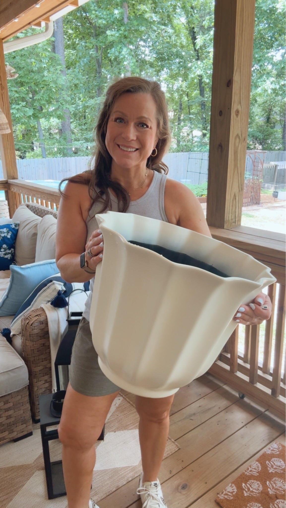 I love the gorgeous shape of this planter 
Two sizes - I have the 18” shown here 
Made of lightweight resin 
Has Drainage holes 
Great size

#LTKSeasonal #LTKHome #LTKmomlife