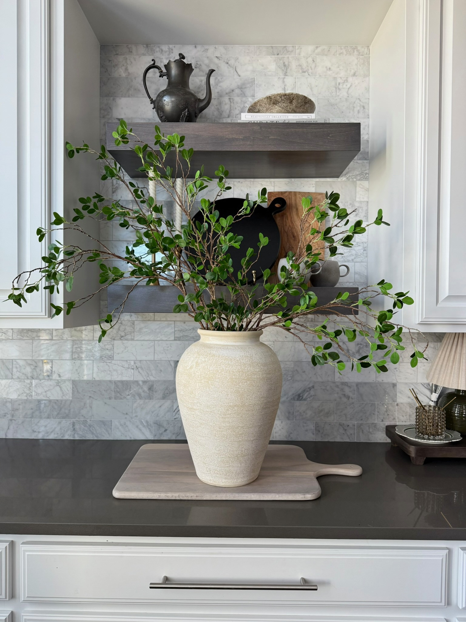 One of my favorite faux stems! 🌱 Greenery can be used year round if you don’t want to change your arrangements 🥰🪴

#fauxstems #fauxgreenery #artificialarrangements #kitchendecor #kitchenstyling #homedecor #neutralhomedecor #elevatedhome #ceramicvase

#LTKHome #LTKFindsUnder50 #LTKSeasonal