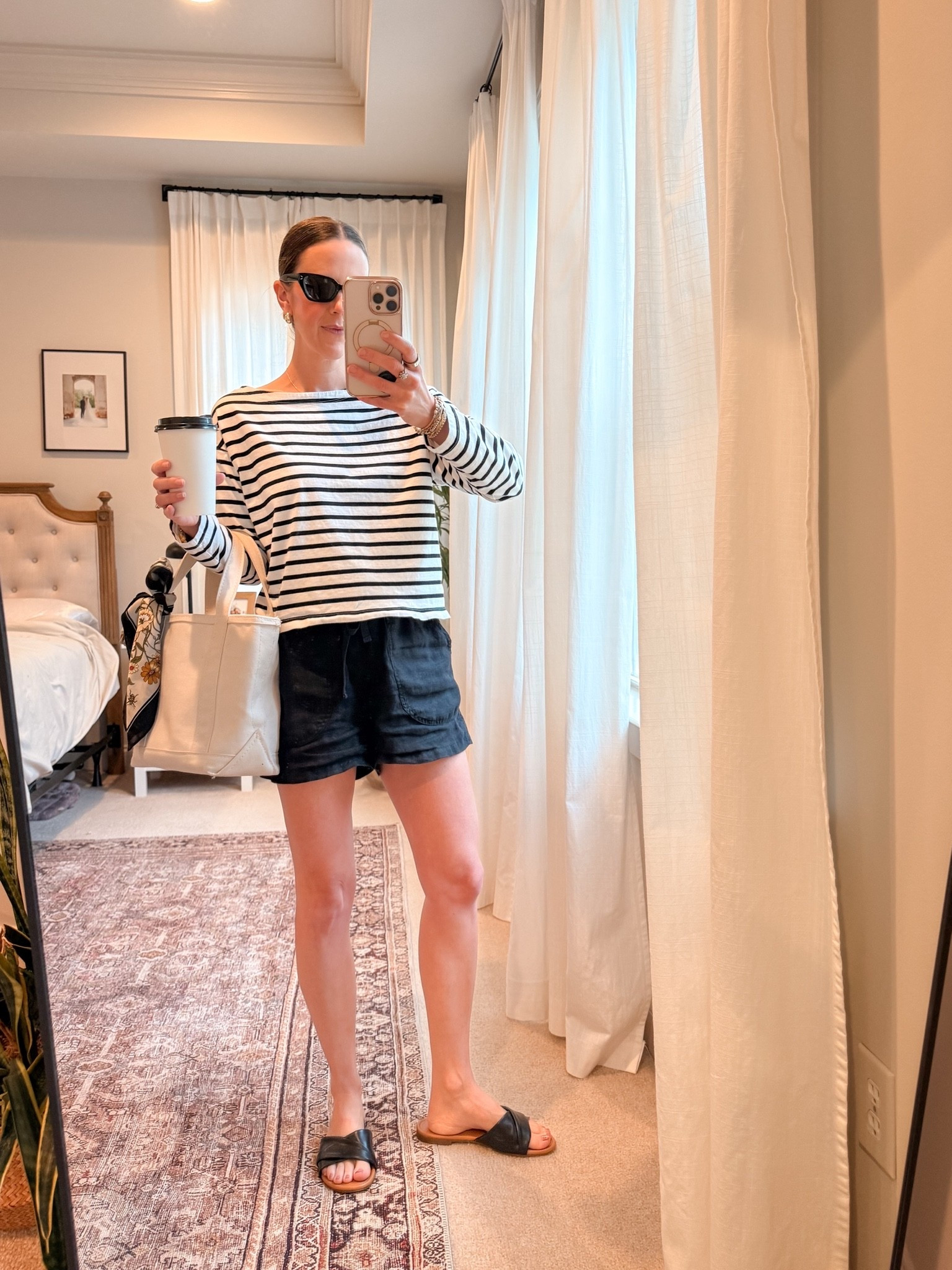 Casual mom chic - a go-to summer capsule outfit 🤍 Quince linen shorts (wearing size S) are so comfy but still look polished (easy coastal / classic vibe). Paired with a striped top + simple black slide sandals for an effortless everyday mom outfit / vacation outfit / weekend outfit.

Quince code: INFG-26LINENANDLIGHTCO10 🫶

#LTKootd #LTKmomlife #LTKSeasonal