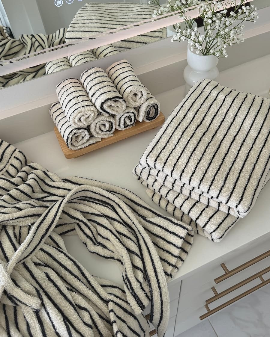 Neutral Bathroom Finds 🤍

The prettiest striped towel set for an effortlessly elevated bathroom. I love the soft cream + black stripe, especially styled with matching washcloths, a cozy robe, simple florals, and warm wood accents. Such an easy way to get that clean, spa-inspired bathroom look while still feeling cozy and lived-in.

#BathroomDecor #BathroomInspo #NeutralBathroom #NeutralHome #NeutralDecor #BathroomIdeas #SpaBathroom #SpaInspired #CozyBathroom #ModernBathroom #OrganicModern #OrganicModernDecor #StripedTowels #BathroomTowels #HomeDecor #HomeInspiration #InteriorInspo #AestheticHome #MinimalistDecor #CozyHome

#LTKSaleAlert #LTKHome #LTKmomlife
